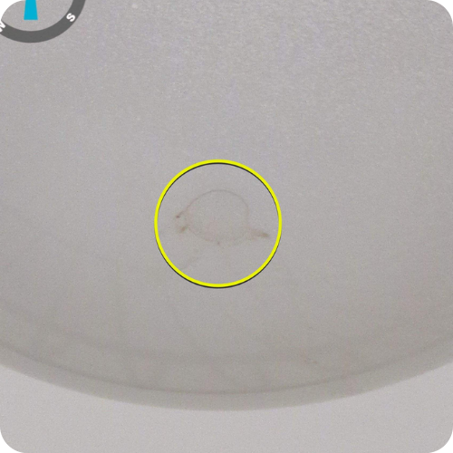 Close-up image showing drain line deterioration
