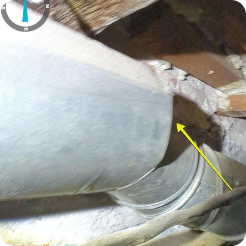 Close-up image showing drain line deterioration