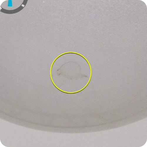 Close-up image showing drain line deterioration