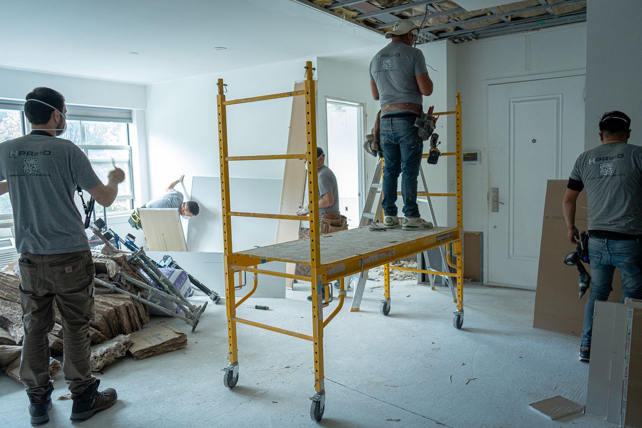HPRE+D renovation crew working in a condominium interior